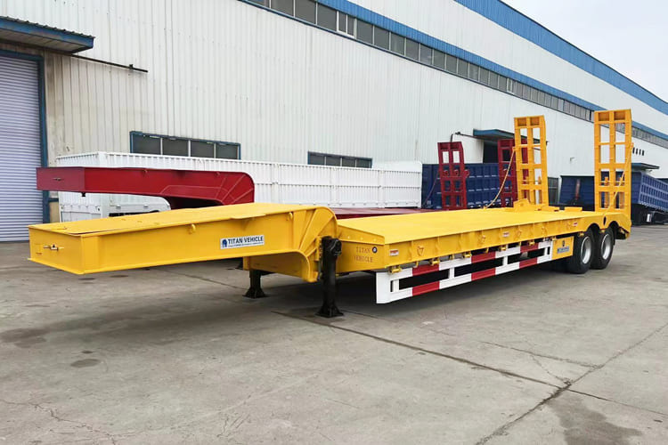 TITAN 2 Axle Low Bed Trailer for Sale in Guyana - Félpótkocsi mélybölcsős: 1 kép. TITAN 2 Axle Low Bed Trailer for Sale in Guyana - Félpótkocsi mélybölcsős: 1 kép.