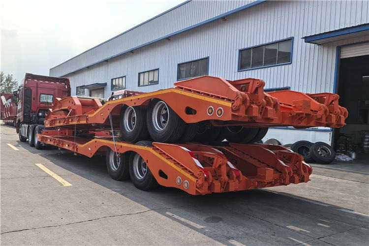 TITAN 2 Axle Low Low Bed Trailer for Sale In Angola - Félpótkocsi mélybölcsős: 3 kép. TITAN 2 Axle Low Low Bed Trailer for Sale In Angola - Félpótkocsi mélybölcsős: 3 kép.