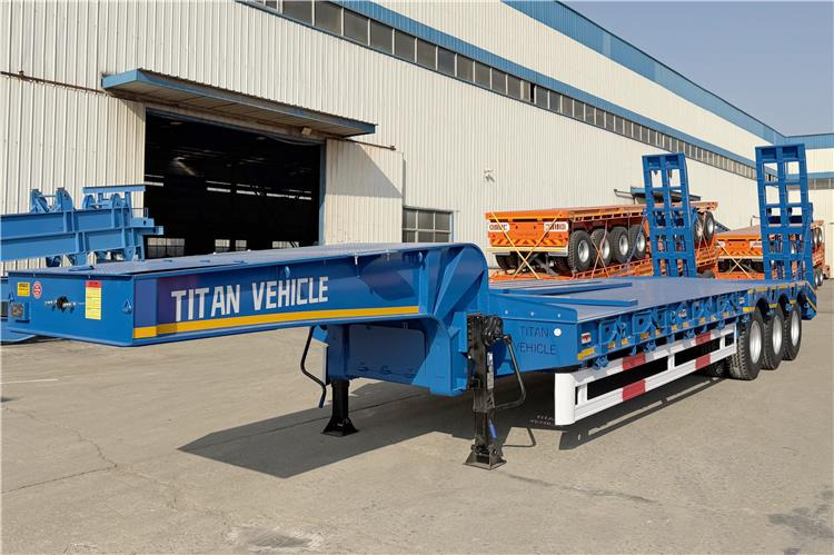 TITAN 3 Axle 80 Ton Low Bed Trailer Price for Sale In Nigeria - Félpótkocsi mélybölcsős: 1 kép. TITAN 3 Axle 80 Ton Low Bed Trailer Price for Sale In Nigeria - Félpótkocsi mélybölcsős: 1 kép.