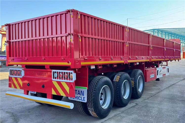 TITAN 3 Axle Drop Side Trailer for Sale In Zimbabwe - Platós félpótkocsi: 1 kép. TITAN 3 Axle Drop Side Trailer for Sale In Zimbabwe - Platós félpótkocsi: 1 kép.