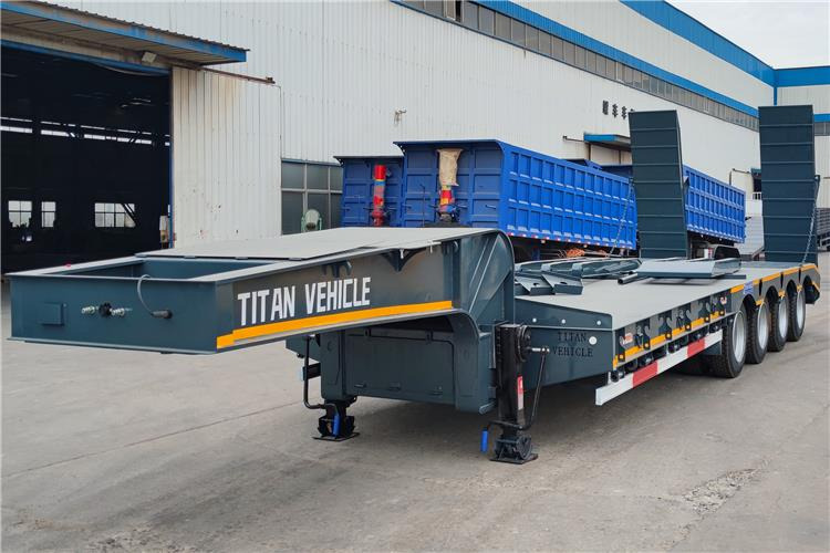 TITAN 4 Axle Low Loader Trailer for Sale In Jamaica - Félpótkocsi mélybölcsős: 1 kép. TITAN 4 Axle Low Loader Trailer for Sale In Jamaica - Félpótkocsi mélybölcsős: 1 kép.