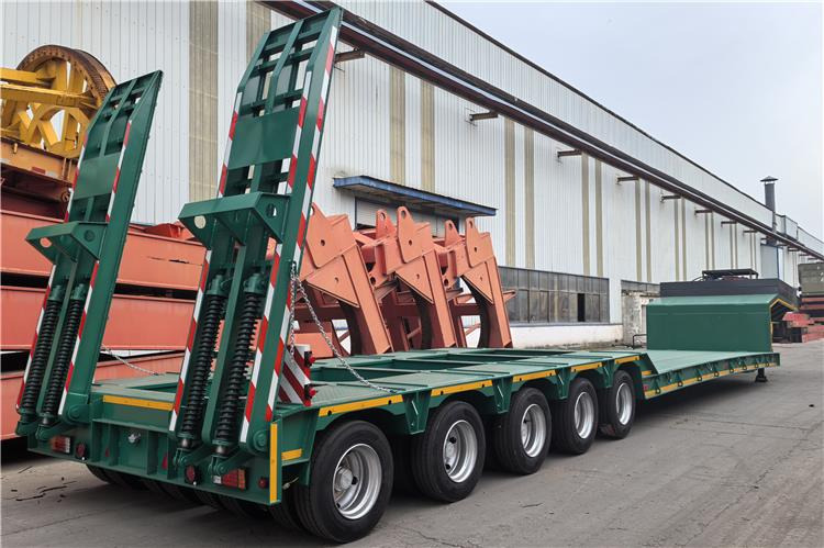 TITAN 5 Axle Low Bed Trailer for Sale In Nigeria - Félpótkocsi mélybölcsős: 3 kép. TITAN 5 Axle Low Bed Trailer for Sale In Nigeria - Félpótkocsi mélybölcsős: 3 kép.