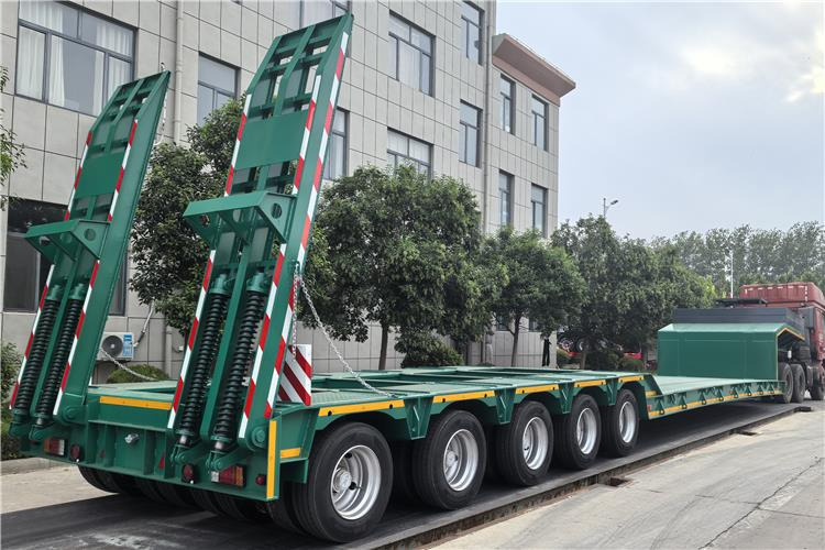 TITAN 5 Axle Low Bed Trailer for Sale In Nigeria - Félpótkocsi mélybölcsős: 1 kép. TITAN 5 Axle Low Bed Trailer for Sale In Nigeria - Félpótkocsi mélybölcsős: 1 kép.