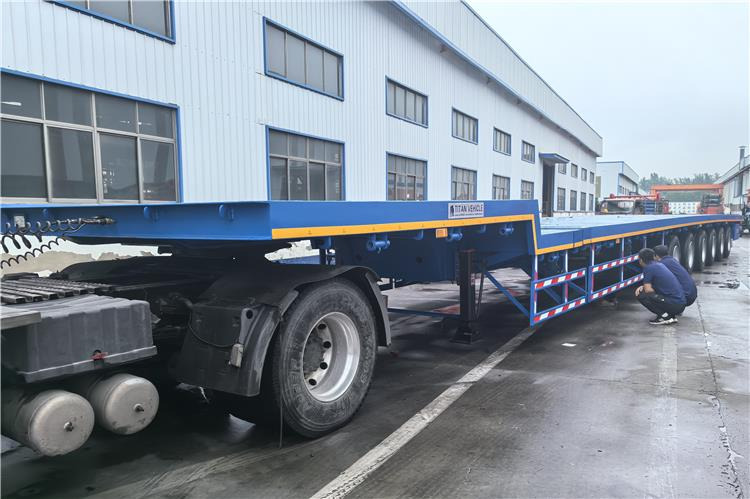 TITAN 6 Axle 54m Telescopic Flatbed Trailer for Sale In Angola - Platós félpótkocsi: 1 kép. TITAN 6 Axle 54m Telescopic Flatbed Trailer for Sale In Angola - Platós félpótkocsi: 1 kép.