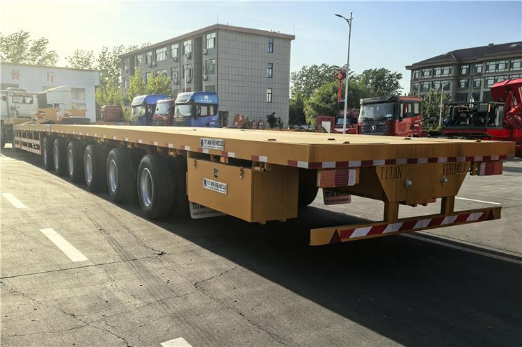 TITAN 6 Axle 62m Extendable Trailer for Sale In Ghana - Platós félpótkocsi: 2 kép. TITAN 6 Axle 62m Extendable Trailer for Sale In Ghana - Platós félpótkocsi: 2 kép.