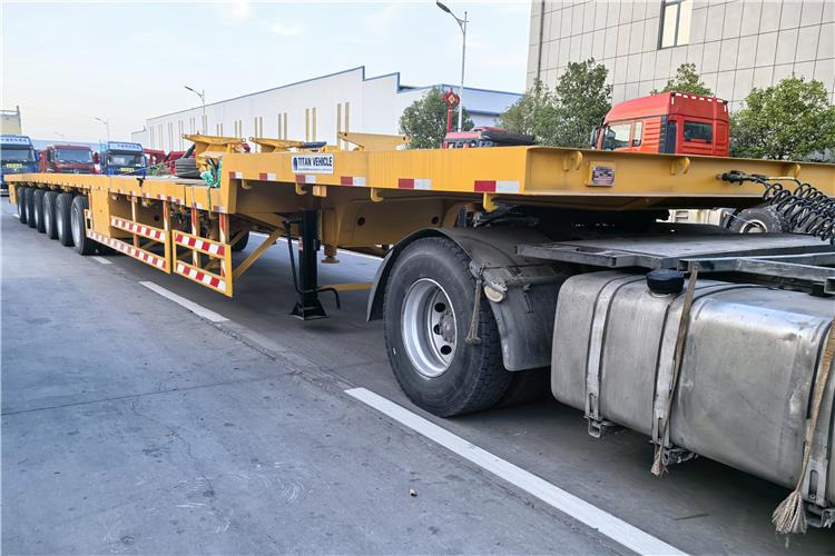 TITAN 6 Axle 62m Extendable Trailer for Sale In Ghana - Platós félpótkocsi: 1 kép. TITAN 6 Axle 62m Extendable Trailer for Sale In Ghana - Platós félpótkocsi: 1 kép.