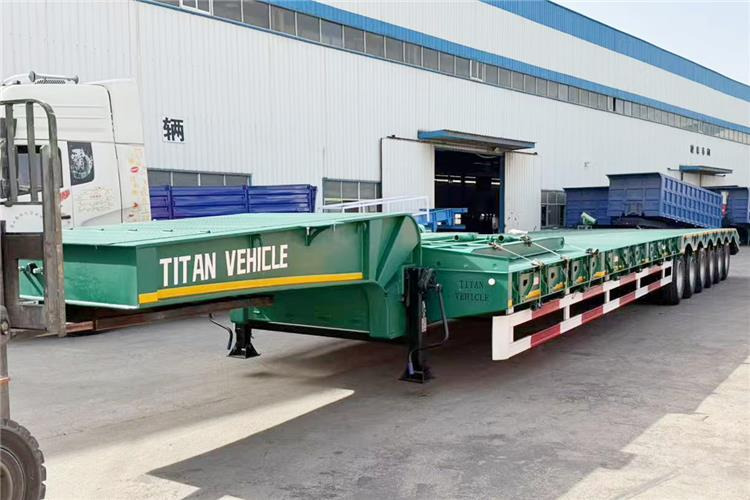 TITAN 6 Axle 80 Ton Low Loader Semi Trailer for Sale In Zambia - Félpótkocsi mélybölcsős: 1 kép. TITAN 6 Axle 80 Ton Low Loader Semi Trailer for Sale In Zambia - Félpótkocsi mélybölcsős: 1 kép.