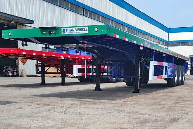 TITAN Flatbed Trailers for Semi Trucks Sizes for Sale in Guinea - Platós félpótkocsi: 2 kép. TITAN Flatbed Trailers for Semi Trucks Sizes for Sale in Guinea - Platós félpótkocsi: 2 kép.