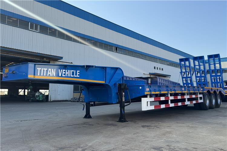 TITAN Tri Axle 80 Ton Low Loader Semi Trailer for Sale In Benin - Félpótkocsi mélybölcsős: 3 kép. TITAN Tri Axle 80 Ton Low Loader Semi Trailer for Sale In Benin - Félpótkocsi mélybölcsős: 3 kép.