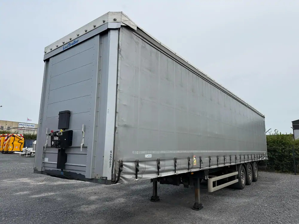 LeciTrailer Tautliner 3E20 Tautliner 3E20*1er essieu relevable*essieux SAF - Ponyvás félpótkocsi: 1 kép. LeciTrailer Tautliner 3E20 Tautliner 3E20*1er essieu relevable*essieux SAF - Ponyvás félpótkocsi: 1 kép.