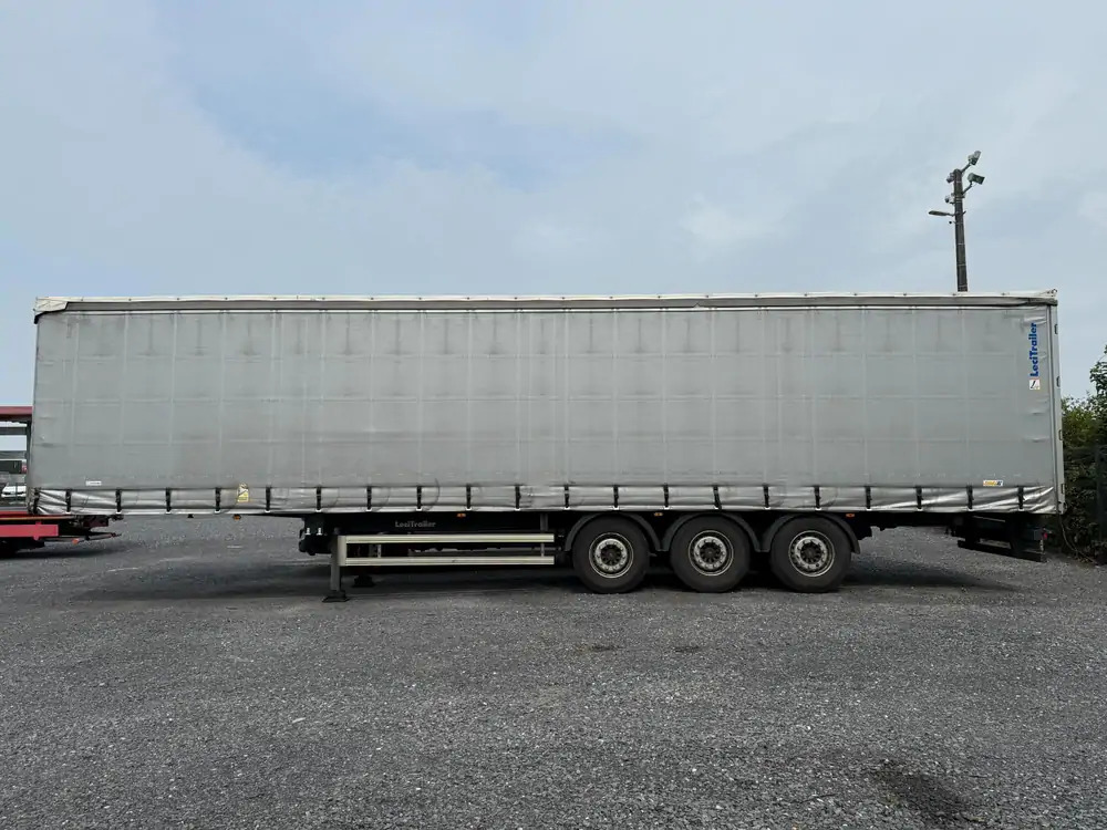 LeciTrailer Tautliner 3E20 Tautliner 3E20*1er essieu relevable*essieux SAF - Ponyvás félpótkocsi: 5 kép. LeciTrailer Tautliner 3E20 Tautliner 3E20*1er essieu relevable*essieux SAF - Ponyvás félpótkocsi: 5 kép.