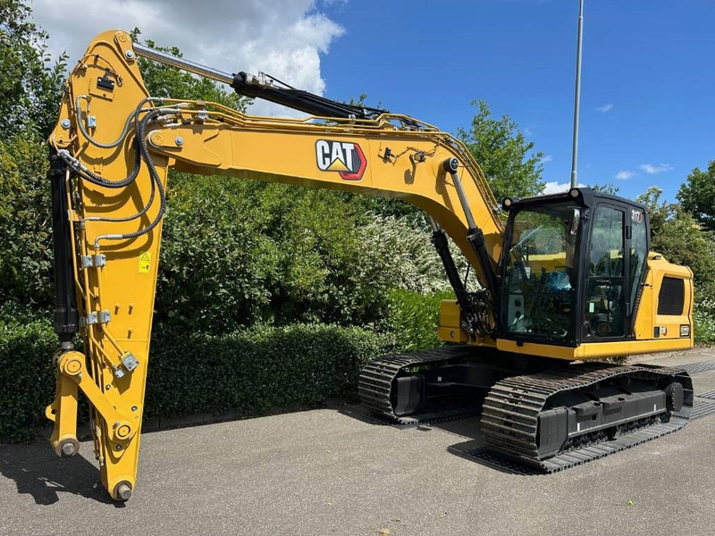 Cat 317 - Lánctalpas kotró: 2 kép. Cat 317 - Lánctalpas kotró: 2 kép.