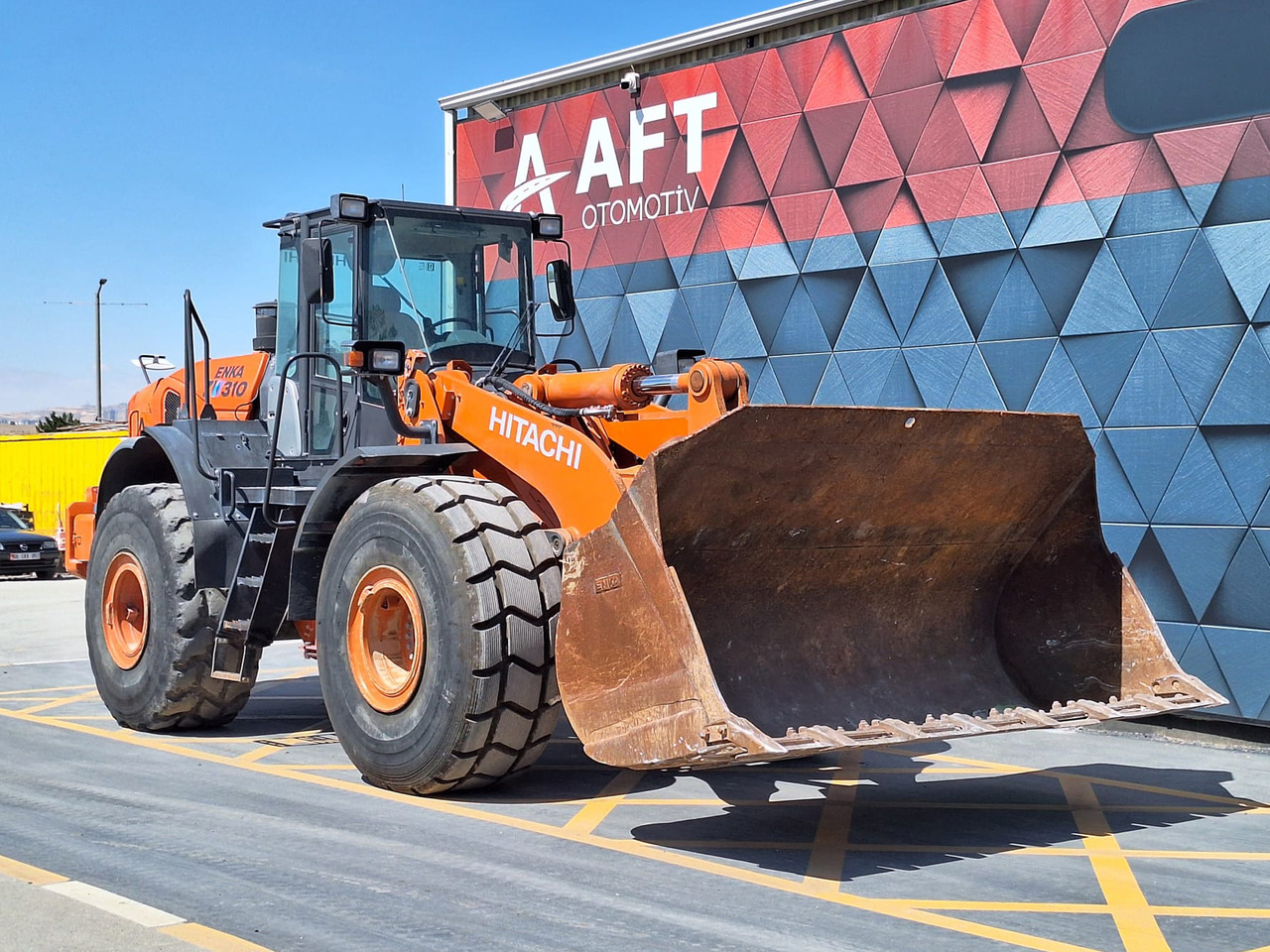 HITACHI ZW 310-5A - Gumikerekes homlokrakodó: 3 kép. HITACHI ZW 310-5A - Gumikerekes homlokrakodó: 3 kép.