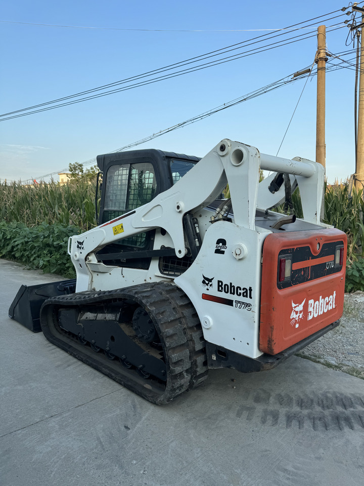 BOBCAT T770 skid steer loader American original Mining/Agriculture/Urban Construction - Mini homlokrakodó: 2 kép. BOBCAT T770 skid steer loader American original Mining/Agriculture/Urban Construction - Mini homlokrakodó: 2 kép.