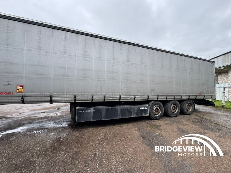 Kögel S 24 - Ponyvás félpótkocsi: 5 kép. Kögel S 24 - Ponyvás félpótkocsi: 5 kép.