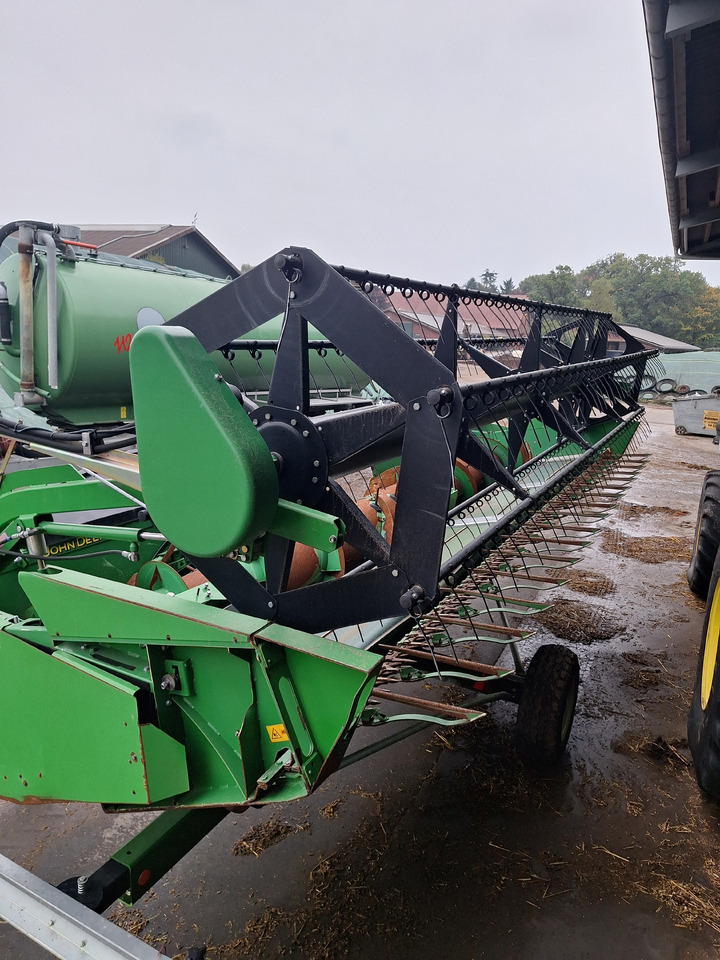 JOHN DEERE T550 - Kombájn: 3 kép. JOHN DEERE T550 - Kombájn: 3 kép.