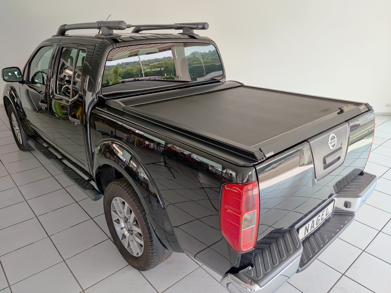 Nissan Navara Pickup (D40M)(05.2005->) Double Cab LE V6 4X4 Navi Kam Leder SHZ AHK - Pickup: 5 kép. Nissan Navara Pickup (D40M)(05.2005->) Double Cab LE V6 4X4 Navi Kam Leder SHZ AHK - Pickup: 5 kép.