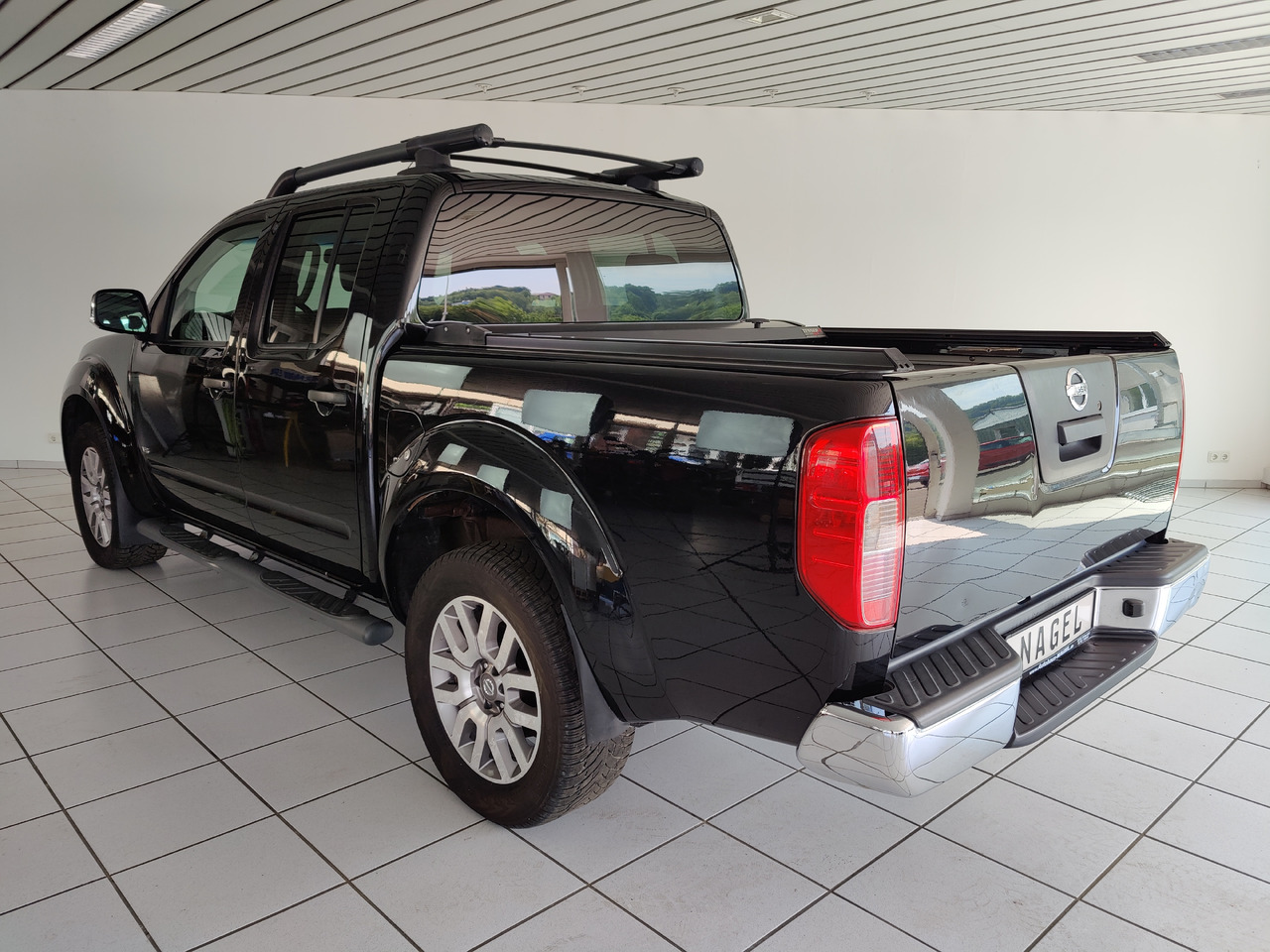 Nissan Navara Pickup (D40M)(05.2005->) Double Cab LE V6 4X4 Navi Kam Leder SHZ AHK - Pickup: 4 kép. Nissan Navara Pickup (D40M)(05.2005->) Double Cab LE V6 4X4 Navi Kam Leder SHZ AHK - Pickup: 4 kép.