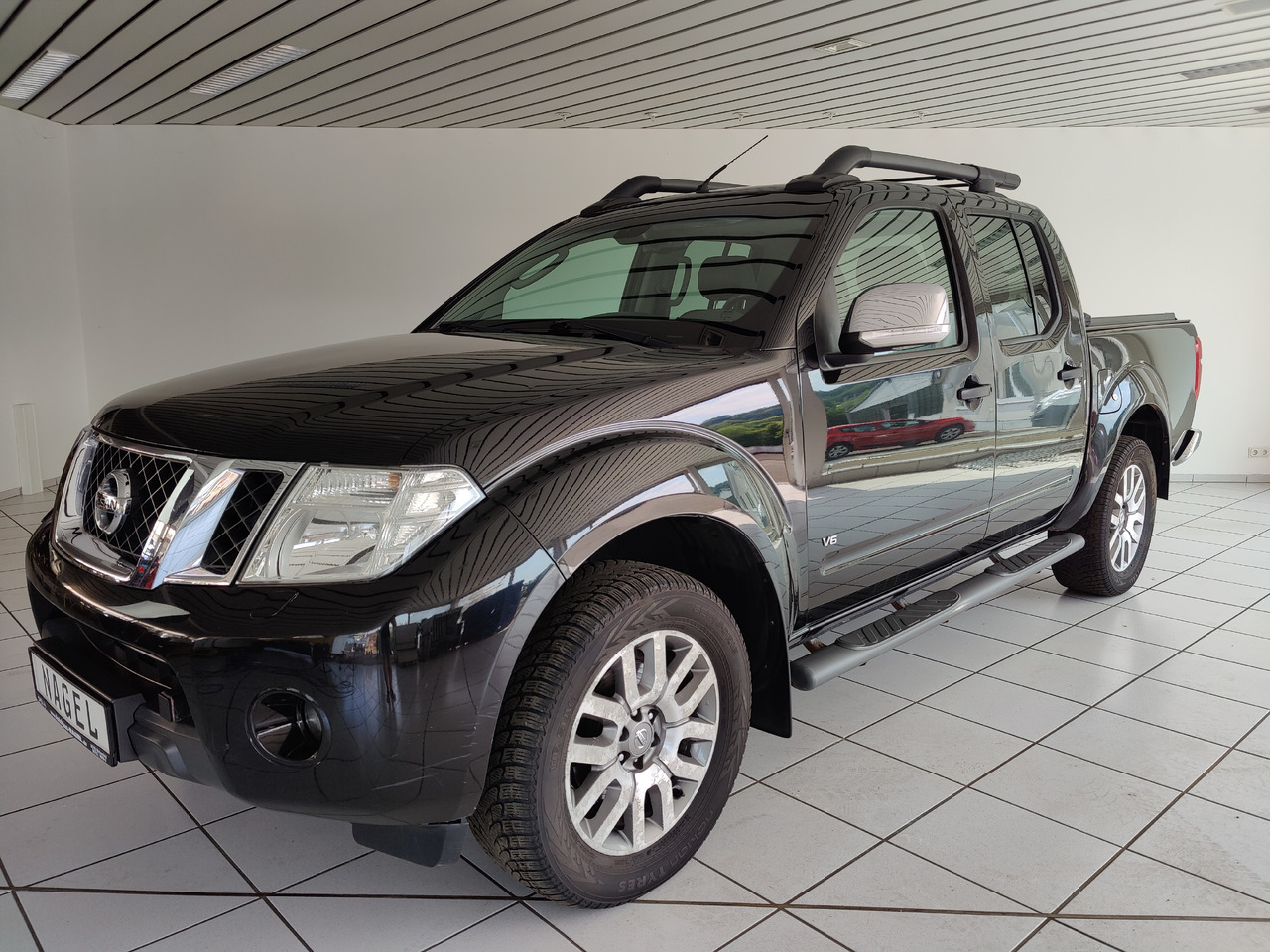 Nissan Navara Pickup (D40M)(05.2005->) Double Cab LE V6 4X4 Navi Kam Leder SHZ AHK - Pickup: 1 kép. Nissan Navara Pickup (D40M)(05.2005->) Double Cab LE V6 4X4 Navi Kam Leder SHZ AHK - Pickup: 1 kép.