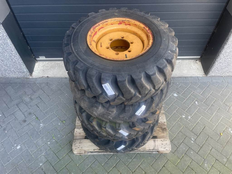 Everest 12.5-18 - Tire/Reifen/Band - Gumiabroncsok és felnik - Építőipari gépek: 4 kép. Everest 12.5-18 - Tire/Reifen/Band - Gumiabroncsok és felnik - Építőipari gépek: 4 kép.