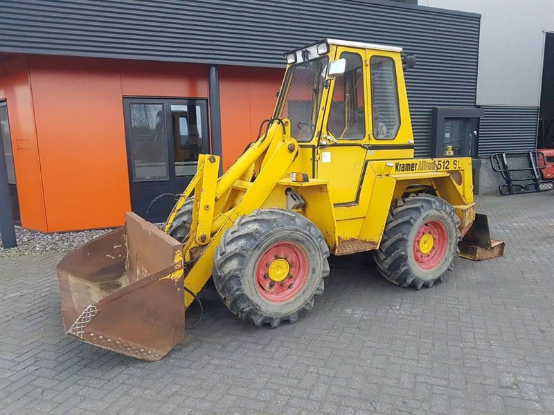 Kramer 512 - (For parts) - Gumikerekes homlokrakodó: 2 kép. Kramer 512 - (For parts) - Gumikerekes homlokrakodó: 2 kép.