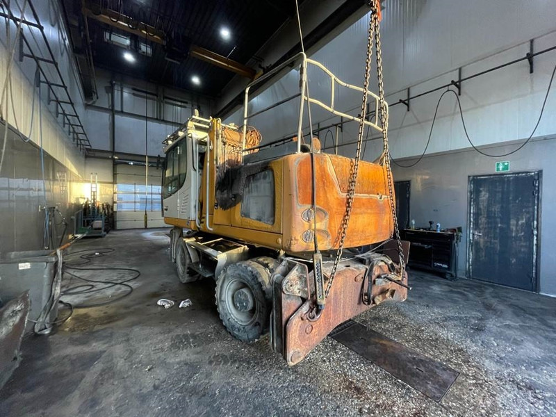 Liebherr LH 22 M - (For parts) - Gumikerekes kotró: 2 kép. Liebherr LH 22 M - (For parts) - Gumikerekes kotró: 2 kép.