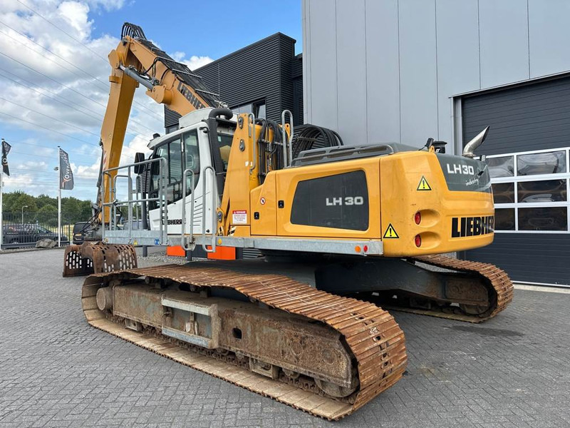 Liebherr LH 30 C - Hulladék kotró: 3 kép. Liebherr LH 30 C - Hulladék kotró: 3 kép.