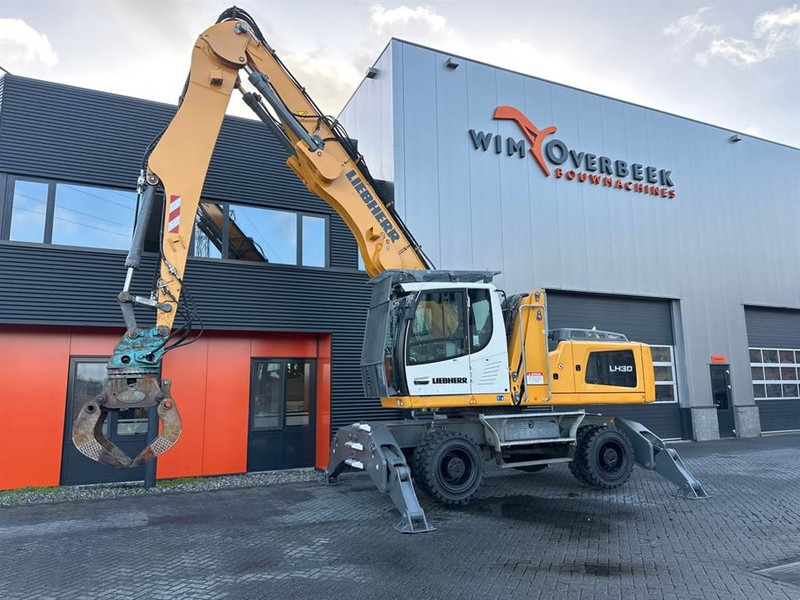Liebherr LH 30 M - Hulladék kotró: 5 kép. Liebherr LH 30 M - Hulladék kotró: 5 kép.