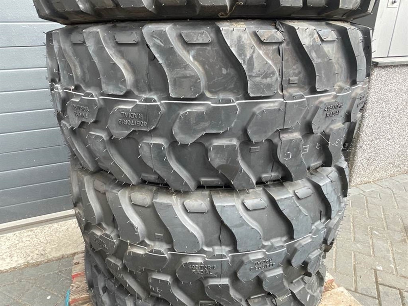 Magna 405/70R18-Tire/Reifen/Band - Gumiabroncsok és felnik - Építőipari gépek: 3 kép. Magna 405/70R18-Tire/Reifen/Band - Gumiabroncsok és felnik - Építőipari gépek: 3 kép.