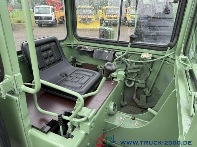 Unimog U427/10 Schaeff Mobilbagger AT 16 NUR 175 TKM - Kisteherautó: 4 kép. Unimog U427/10 Schaeff Mobilbagger AT 16 NUR 175 TKM - Kisteherautó: 4 kép.
