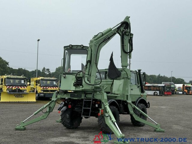 Gumikerekes kotró Unimog U427/10 Schaeff Mobilbagger AT 16 NUR 175 TKM: 13 kép.