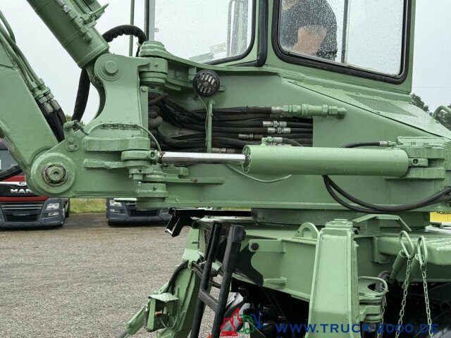 Gumikerekes kotró Unimog U427/10 Schaeff Mobilbagger AT 16 NUR 175 TKM: 6 kép.