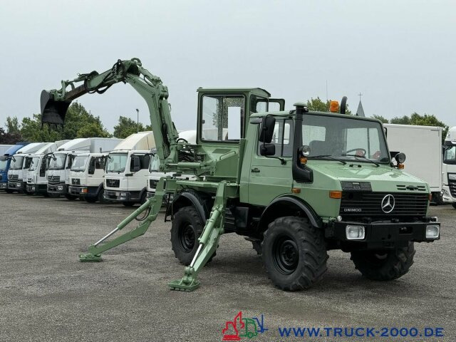 Gumikerekes kotró Unimog U427/10 Schaeff Mobilbagger AT 16 NUR 175 TKM: 7 kép.