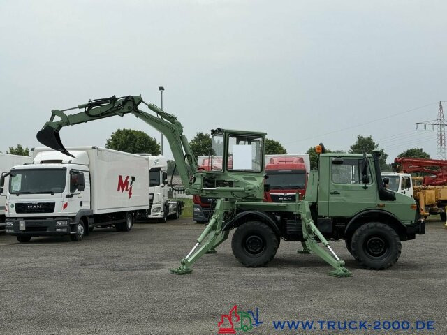 Gumikerekes kotró Unimog U427/10 Schaeff Mobilbagger AT 16 NUR 175 TKM: 8 kép.