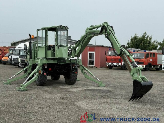 Gumikerekes kotró Unimog U427/10 Schaeff Mobilbagger AT 16 NUR 175 TKM: 12 kép.