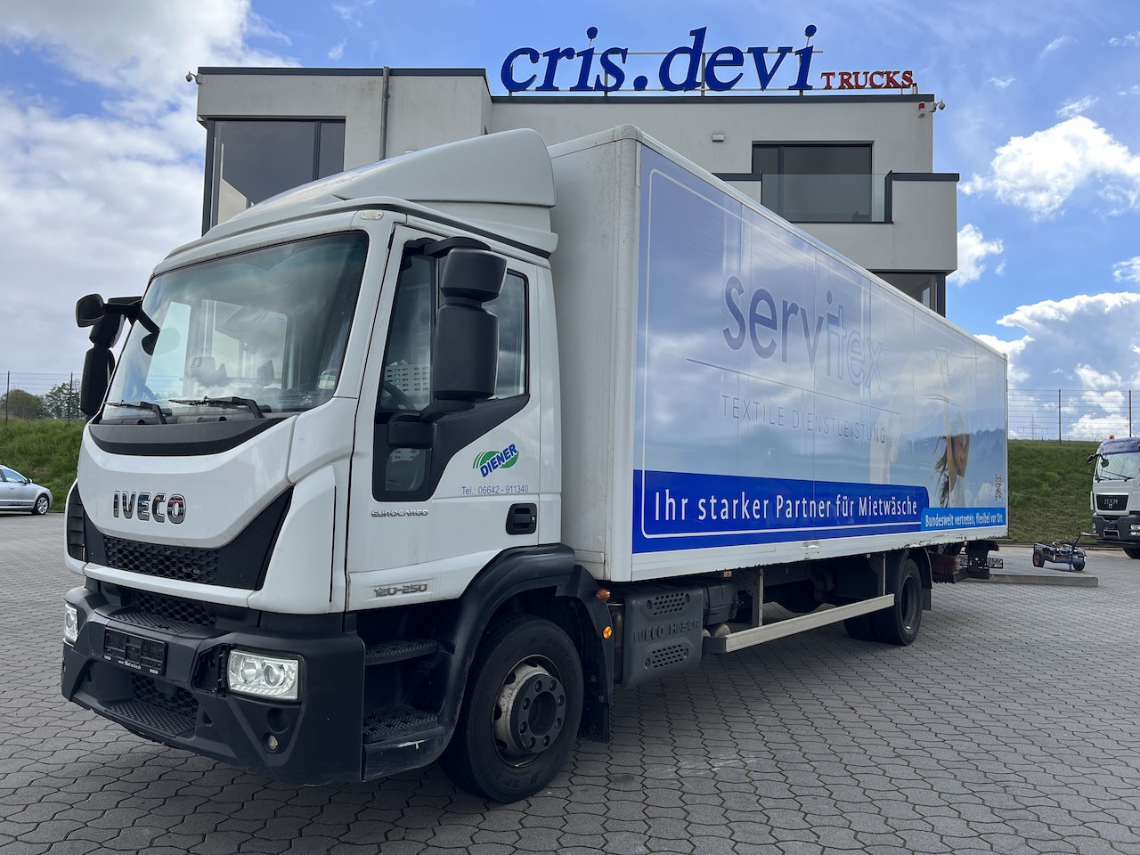 Iveco 120E25 Eurocargo 4x2 Koffer | Ladebordwand - Dobozos felépítményű teherautó: 1 kép. Iveco 120E25 Eurocargo 4x2 Koffer | Ladebordwand - Dobozos felépítményű teherautó: 1 kép.