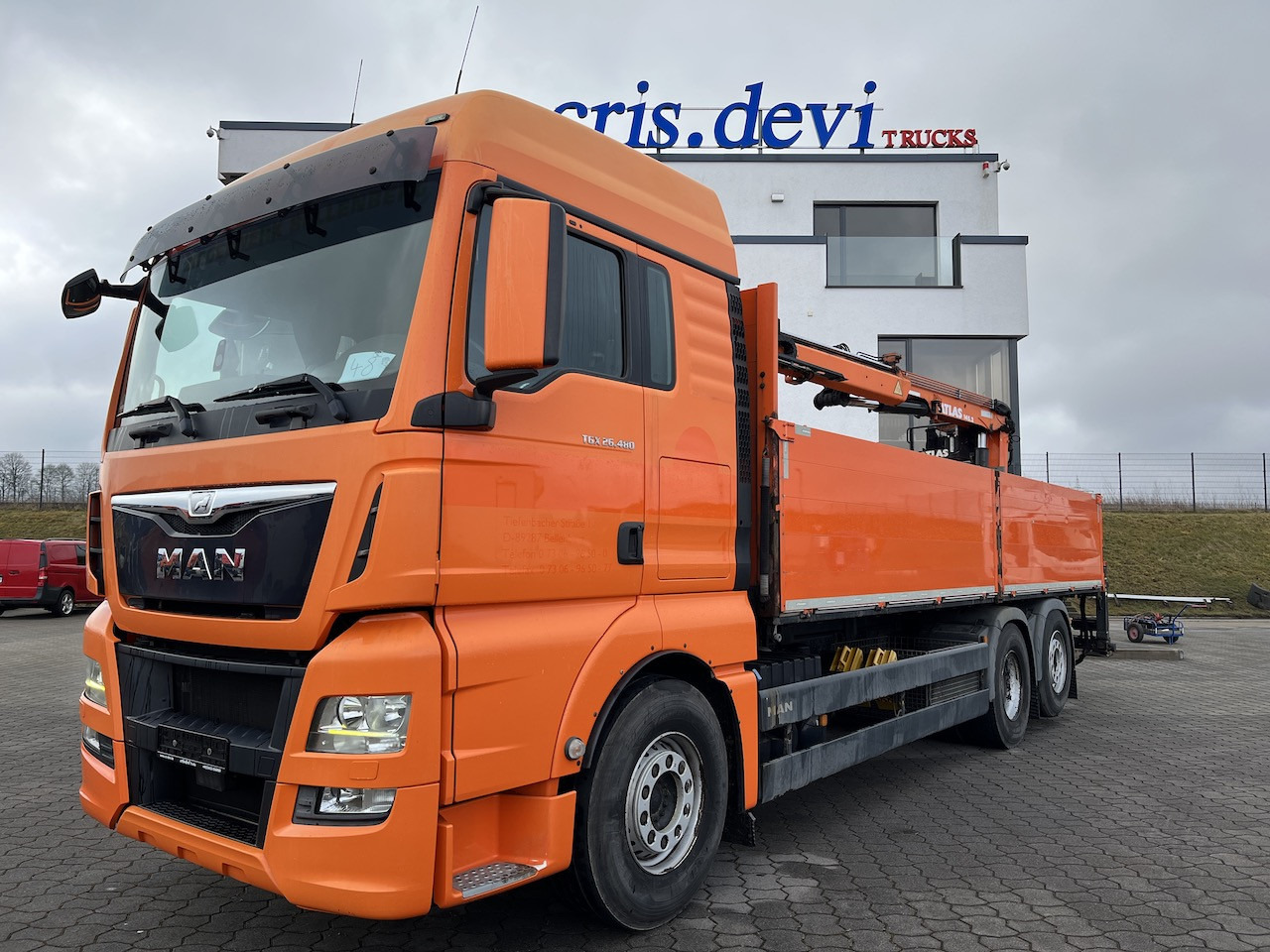 MAN TGX 26.480 6x2 Atlas 145.2 Baustoff - Platós teherautó, Darus autó: 1 kép. MAN TGX 26.480 6x2 Atlas 145.2 Baustoff - Platós teherautó, Darus autó: 1 kép.
