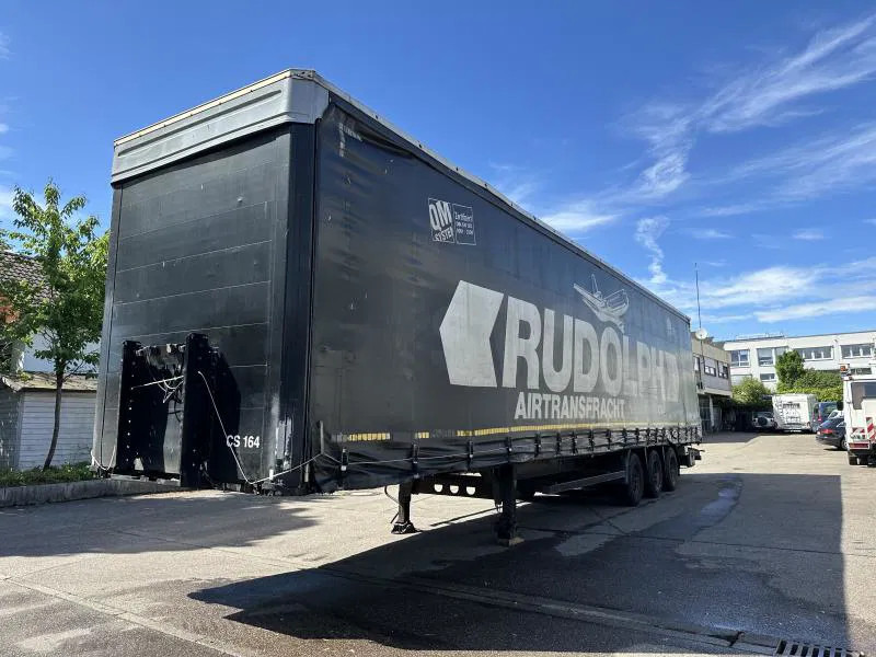 Kögel MEGA Tautliner mit ROLLENBETT Flughafentr. MEGA Tautliner mit ROLLENBETT Flughafentr. - Félpótkocsi dobozos: 1 kép. Kögel MEGA Tautliner mit ROLLENBETT Flughafentr. MEGA Tautliner mit ROLLENBETT Flughafentr. - Félpótkocsi dobozos: 1 kép.
