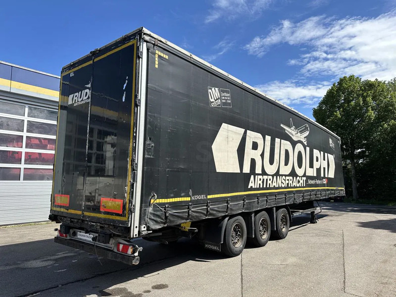 Kögel MEGA Tautliner mit ROLLENBETT Flughafentr. MEGA Tautliner mit ROLLENBETT Flughafentr. - Félpótkocsi dobozos: 5 kép. Kögel MEGA Tautliner mit ROLLENBETT Flughafentr. MEGA Tautliner mit ROLLENBETT Flughafentr. - Félpótkocsi dobozos: 5 kép.