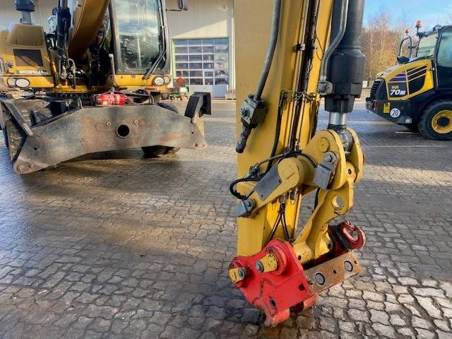 Hulladék kotró a következők szállításához hulladék Cat M 318 D MH (12005607): 9 kép. Hulladék kotró a következők szállításához hulladék Cat M 318 D MH (12005607): 9 kép.