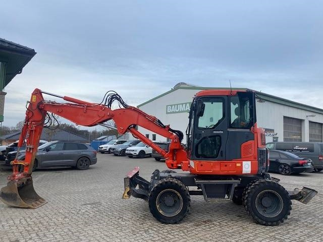 Komatsu PW 98 MR-8 (12005627) - Gumikerekes kotró: 2 kép. Komatsu PW 98 MR-8 (12005627) - Gumikerekes kotró: 2 kép.