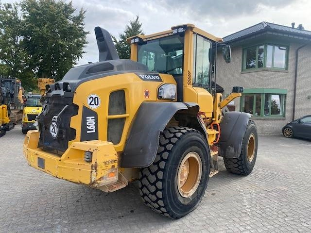 Volvo L 60 H (12005532) - Gumikerekes homlokrakodó: 4 kép. Volvo L 60 H (12005532) - Gumikerekes homlokrakodó: 4 kép.