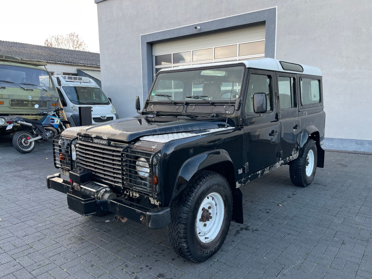 Land Rover Defender 110 SW 2.5 TD , Wohnm.Zulassung, 1.Hand - Terepjáró/ SUV: 3 kép. Land Rover Defender 110 SW 2.5 TD , Wohnm.Zulassung, 1.Hand - Terepjáró/ SUV: 3 kép.
