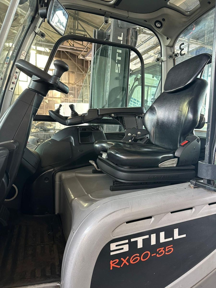 Still RX 60-35 - Elektromos targonca: 3 kép. Still RX 60-35 - Elektromos targonca: 3 kép.