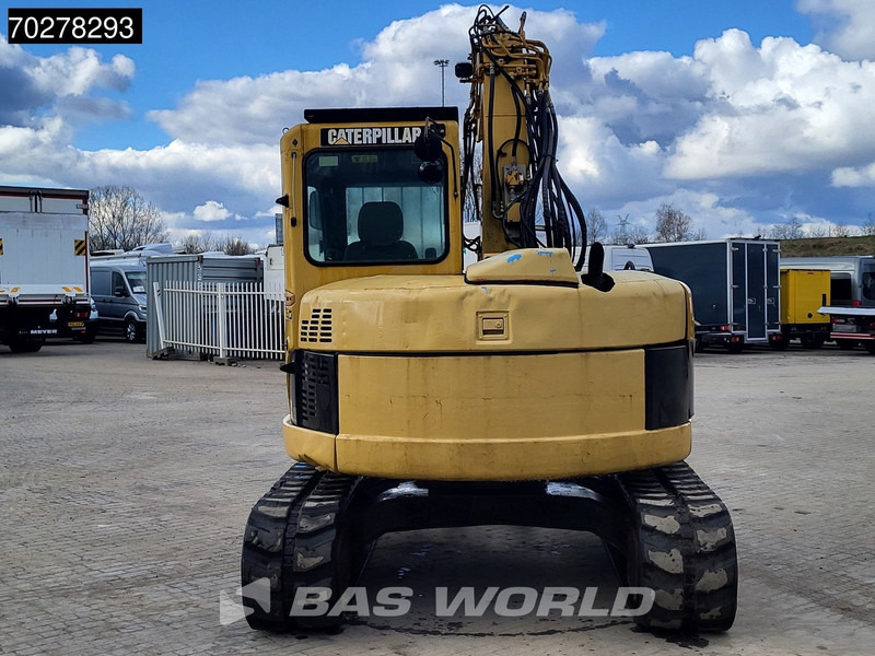 Caterpillar 308C - Minikotró: 3 kép. Caterpillar 308C - Minikotró: 3 kép.