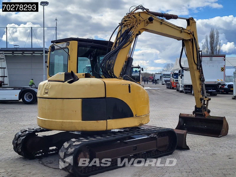 Caterpillar 308C - Minikotró: 5 kép. Caterpillar 308C - Minikotró: 5 kép.