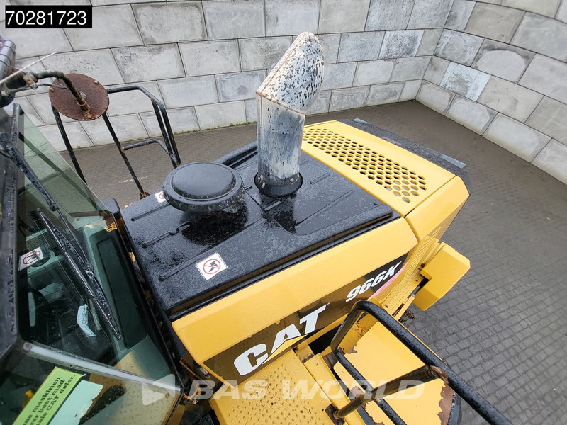 Gumikerekes homlokrakodó Caterpillar 966 K: 16 kép.