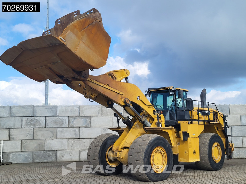 Caterpillar 988 K - Gumikerekes homlokrakodó: 2 kép. Caterpillar 988 K - Gumikerekes homlokrakodó: 2 kép.
