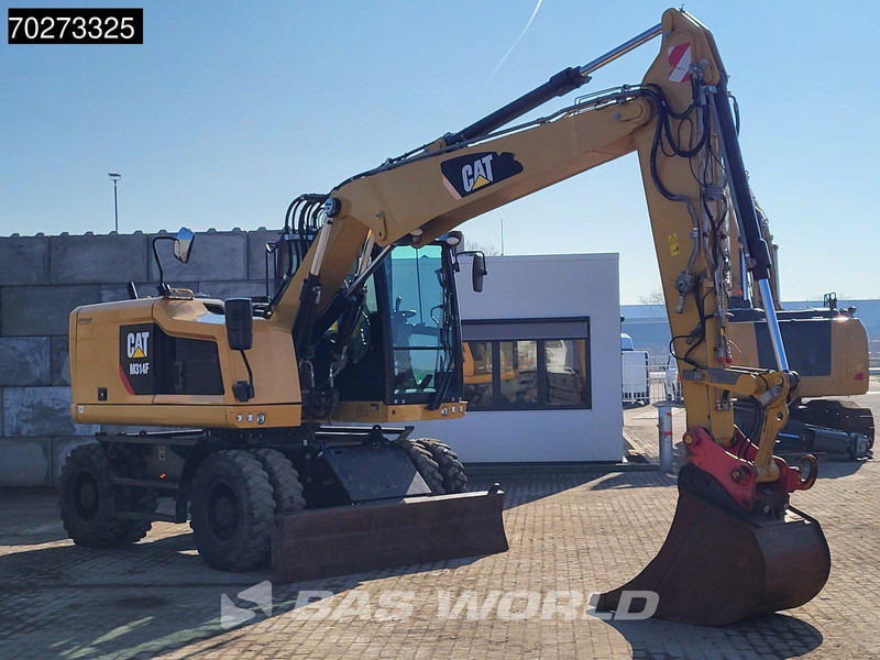 Caterpillar M314 F - Gumikerekes kotró: 3 kép. Caterpillar M314 F - Gumikerekes kotró: 3 kép.