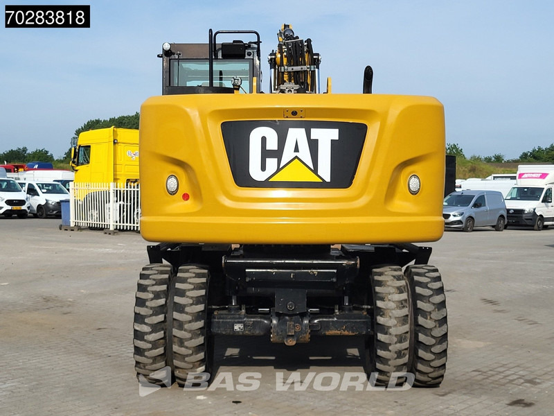 Caterpillar M314 F - Gumikerekes kotró: 3 kép. Caterpillar M314 F - Gumikerekes kotró: 3 kép.